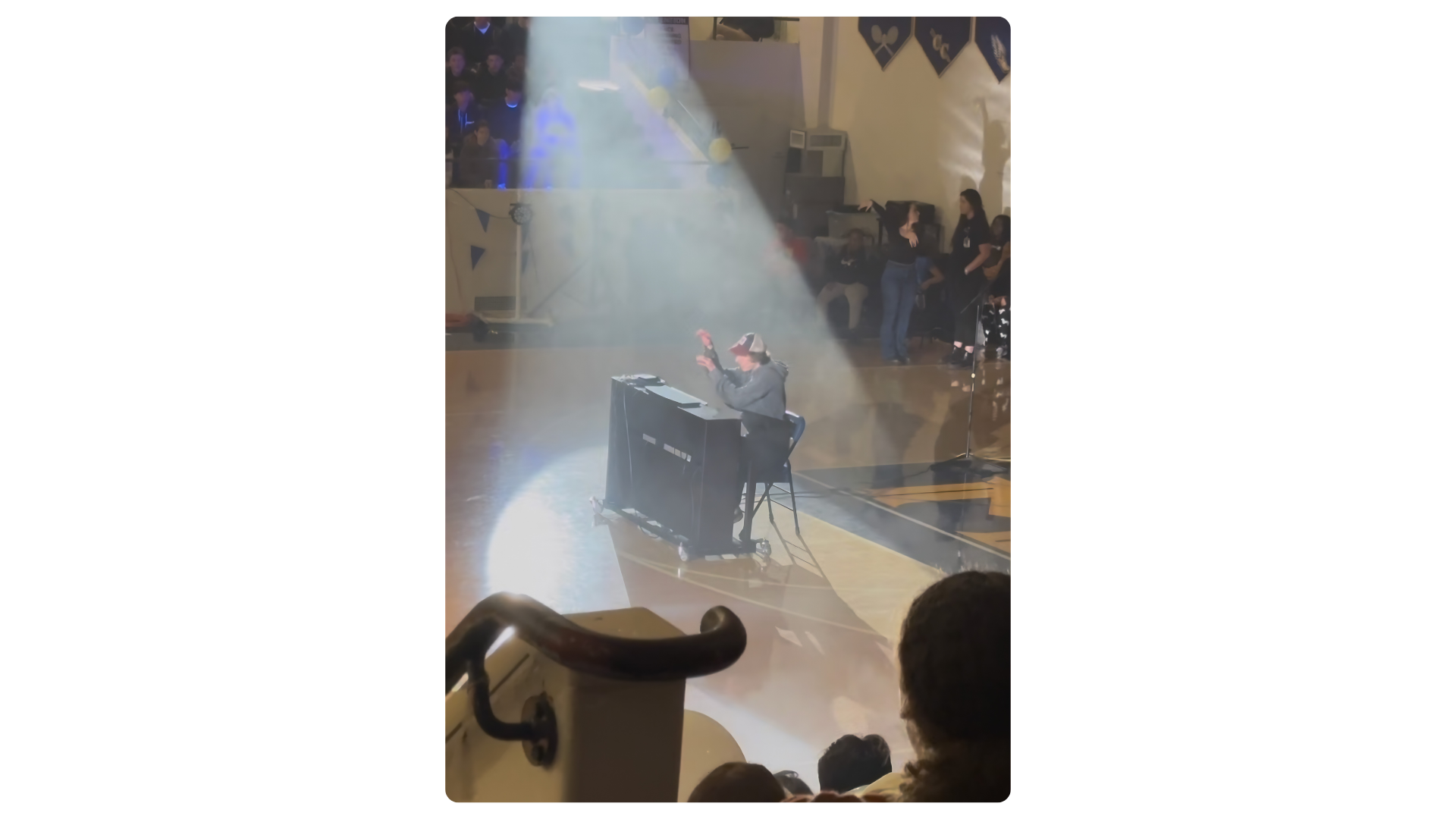 Sam Rubin performing on keyboard at a Samohi event
